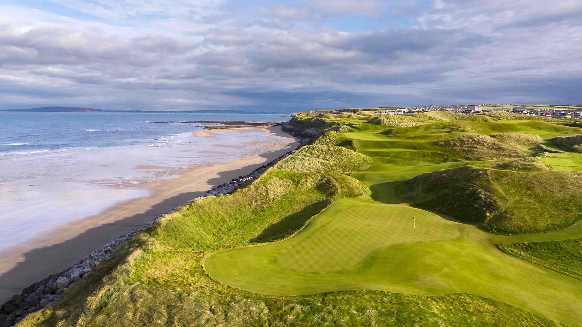 Beautiful morning light on what is perhaps the best par 4 golf hole in Ireland. The 11th of The Old Course at Ballybunion Golf Club along the Irish Sea. Captured with an Inspire 2 drone